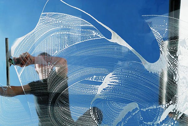 window washing with squeegee